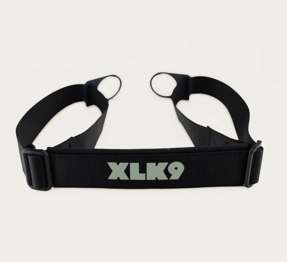 Padded, adjustable carry strap with XLK9 branding.